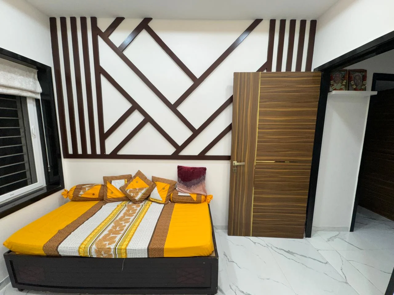 Detail of the bedroom batten feature wall beside the wardrobe