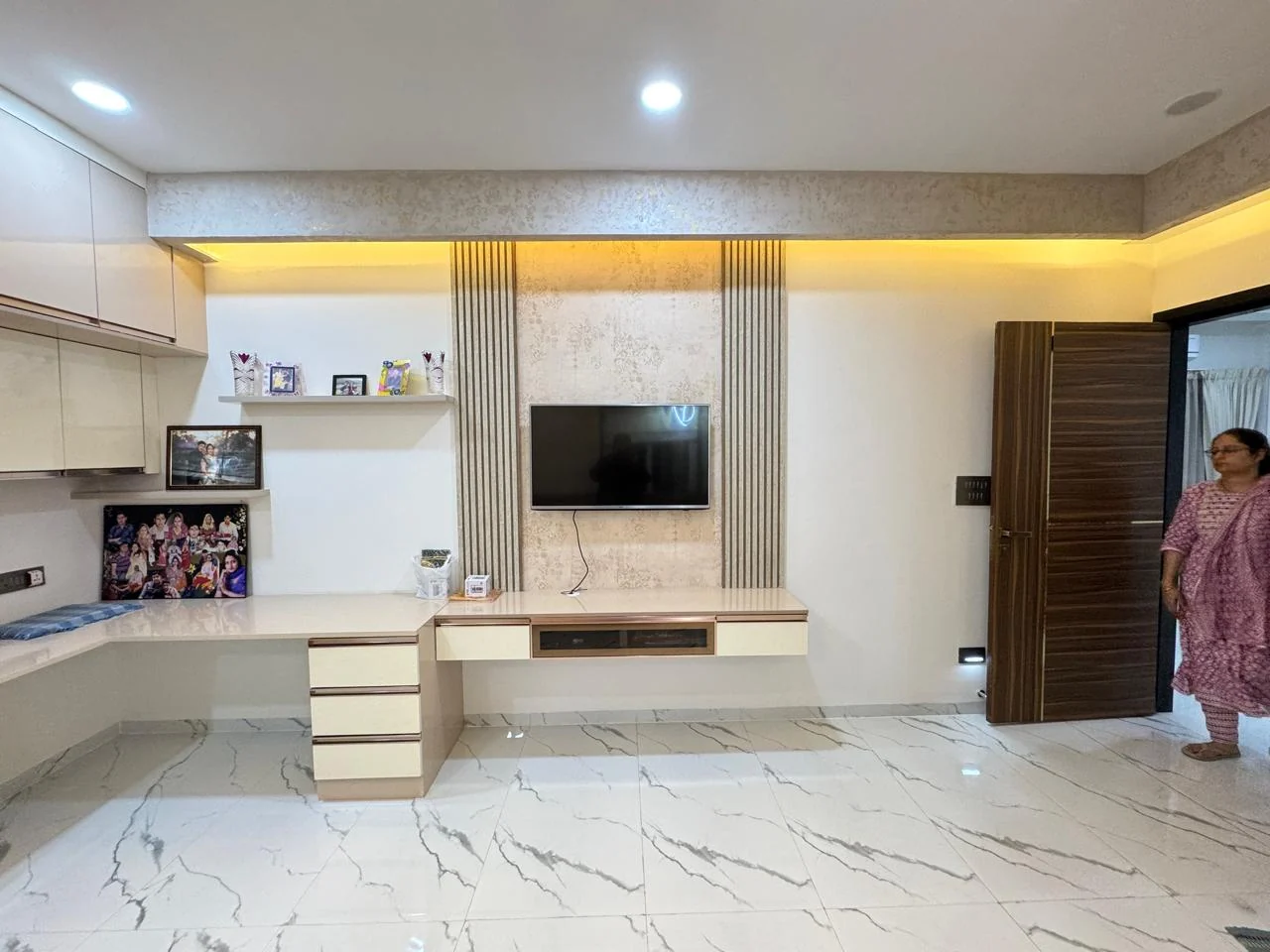 Wide view of a bedroom television and study unit