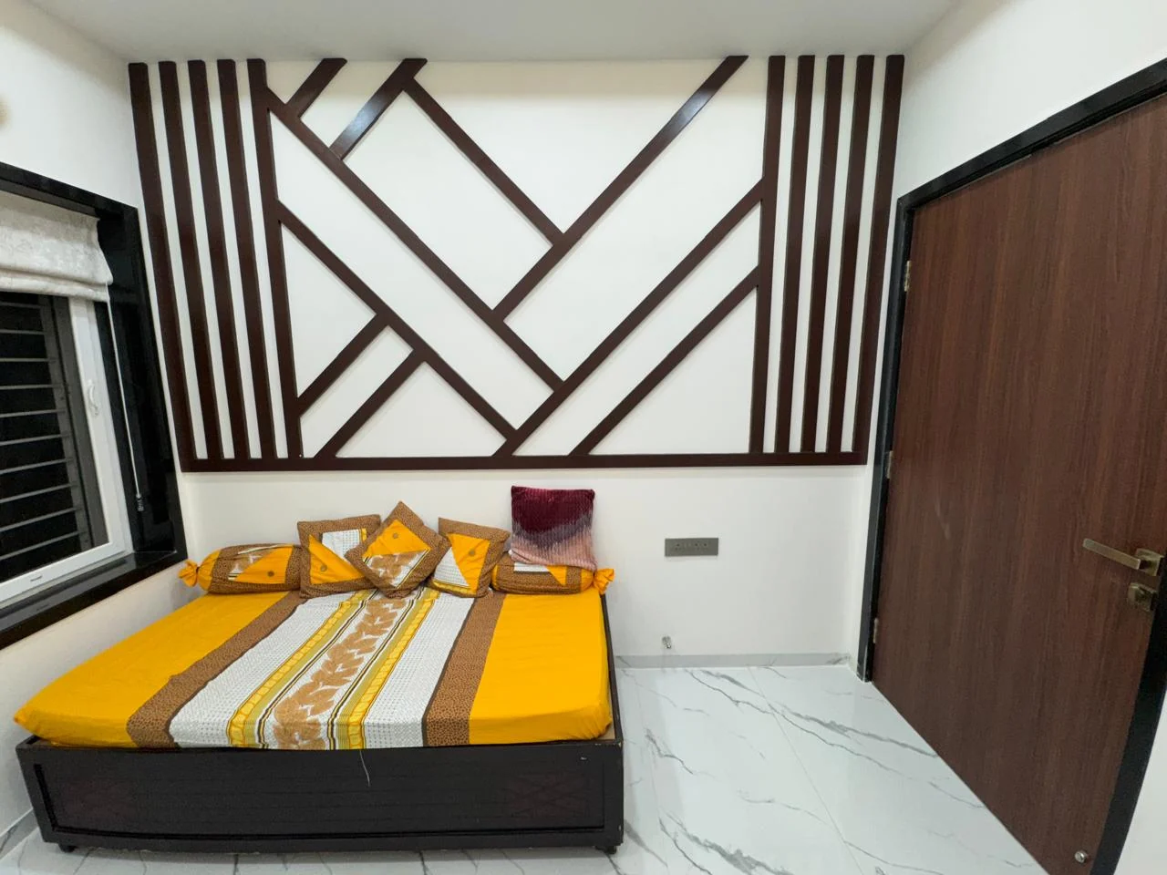 Side view of the timber batten geometric feature wall