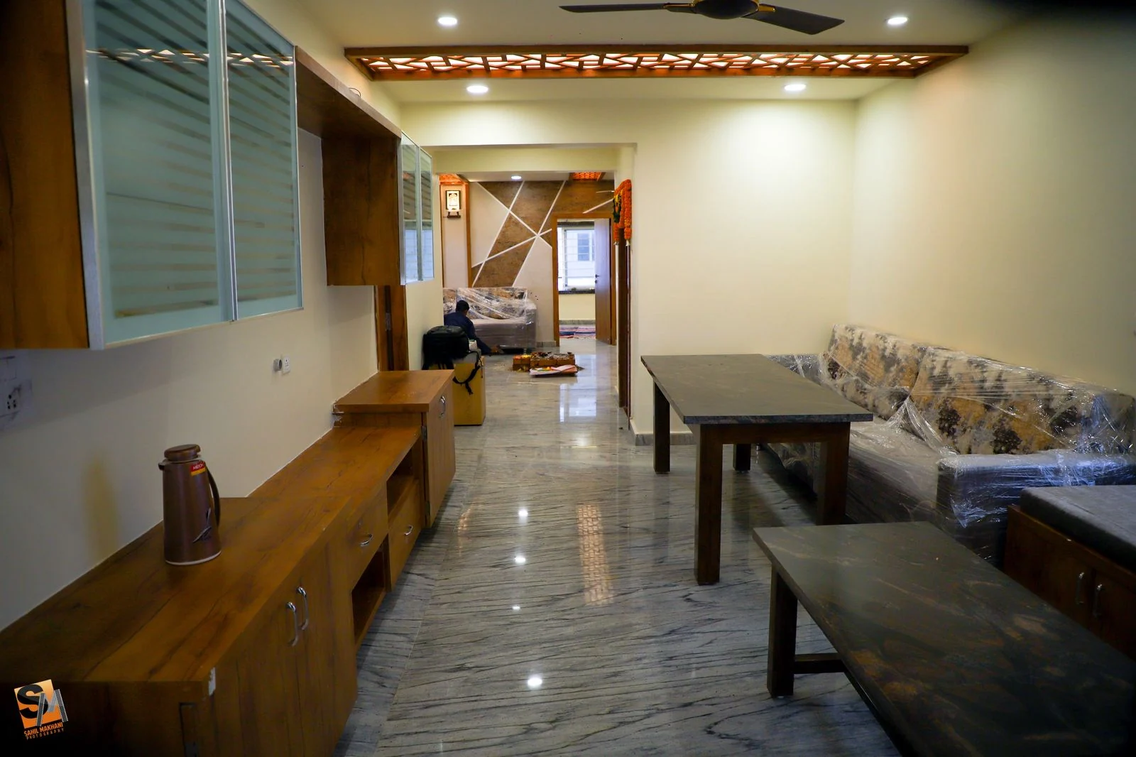 Dining area with a long timber sideboard opposite the granite table