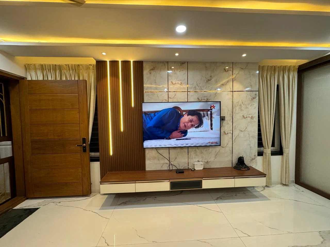 Alternate view of the living room marble television wall